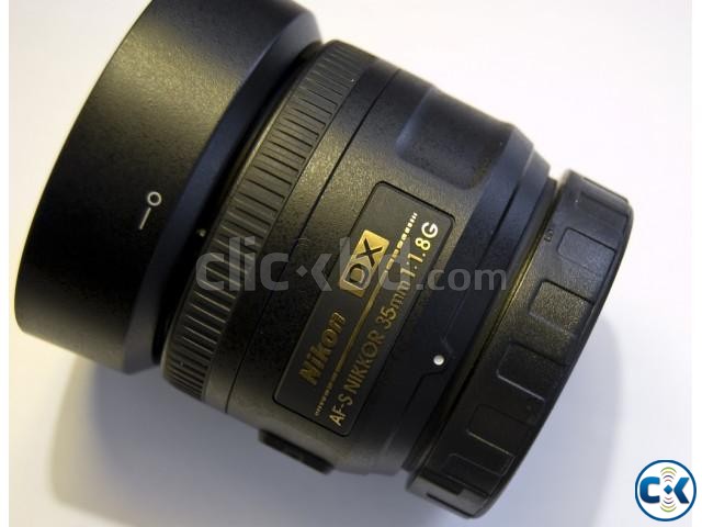 Nikon 35mm f1.8g dx with lens hood and box large image 0