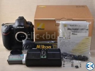 Nikon D4 camera and lens