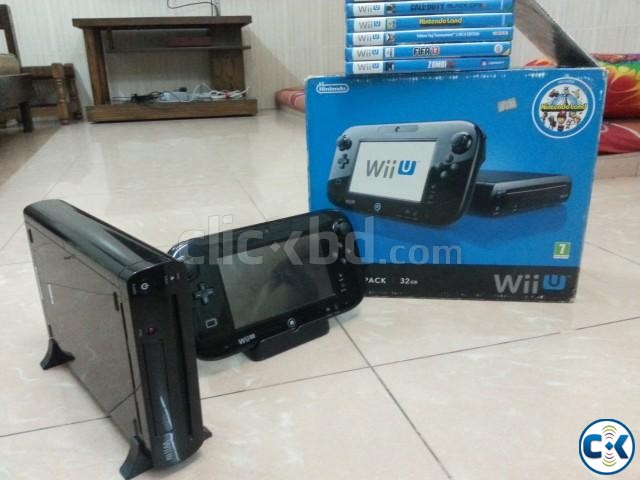 Gaming console Nintendo Wii u with games large image 0