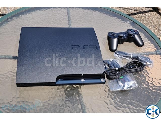 PS3 320GB Slim Fresh with games and controllers large image 0