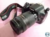 DSLR Canon 550D with 18-135mm lens with waterproof bag