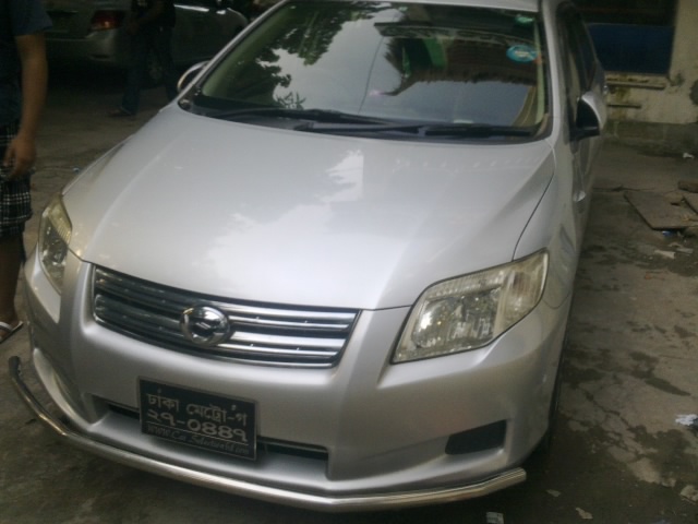 Toyota Axio 2007 model 2009 registration silver color CNG. large image 0