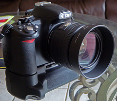 Nikon D3100 with 18-105mm 50 mm - f 1.8 G and battery grip large image 0