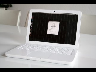 Macbook 13 inch white with 250Gb HDD