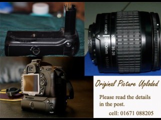 Nikon D90 with 28-80mm lens f 3.3-5.6 battery grip bag