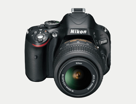 Nikon D5100 with 18-55mm and 35mm prime lens large image 0
