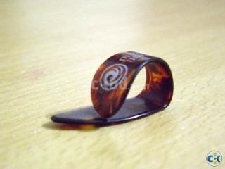 Guitar pick imported ... Thumb holder