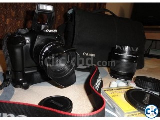 CANON 1100D 2 lens battery grip bag etc