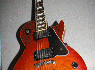 An electric guitar for sell Les Paul Wooden red