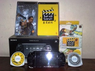 PSP 2004 with 2GB Memory a UMD and a GO cam