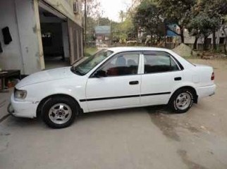 Corolla DX 111 Model- 1998 Reg- 2003 1331cc white color Corolla DX 111 Model- 1998 Reg- 2003 1331cc white color