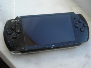 Brand new psp 3004 4 original games