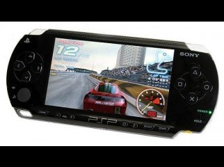 Sony Play Station Portable PSP with Charger UMD Games. Sony Play Station Portable PSP with Charger UMD Games.