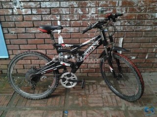 Laux Bicycle For Sell With A Pumper nd a speed meter 