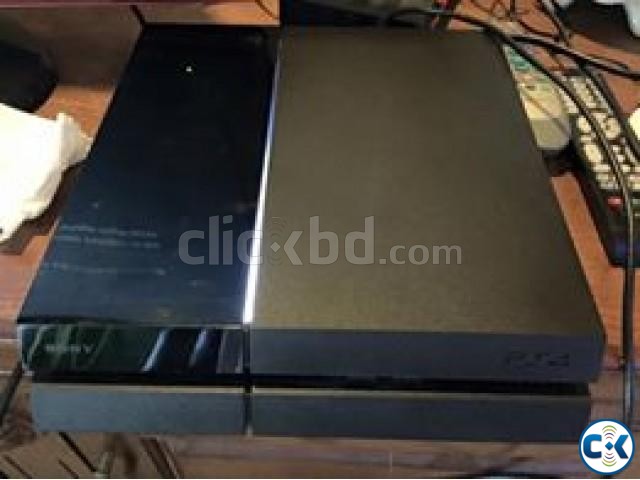 Playstation 4 w 2 games large image 0