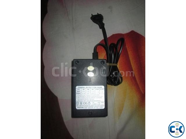 Rechargeable battery with charger large image 0