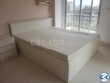 double bed with side tables