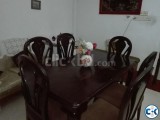 Dining table with chairs.