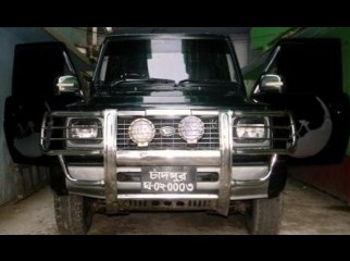 Its a Black manual 4X4 2300CC SUV