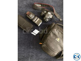 Canon DSLR Kiss X4 with 50mm prime lens and external flash