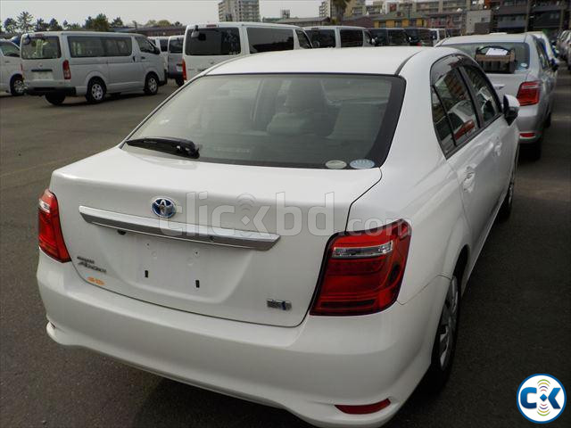 TOYOTA COROLLA AXIO HYBRID OLD SHAPE WHITE 23 50000 large image 1