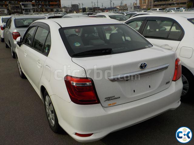 TOYOTA COROLLA AXIO HYBRID OLD SHAPE WHITE 23 50000 large image 2