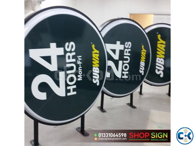 A sign board with a bell symbol on it. bell sign board. large image 2