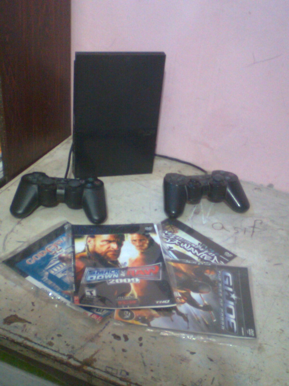 PS2 with 10 games and 1wireless controller large image 0
