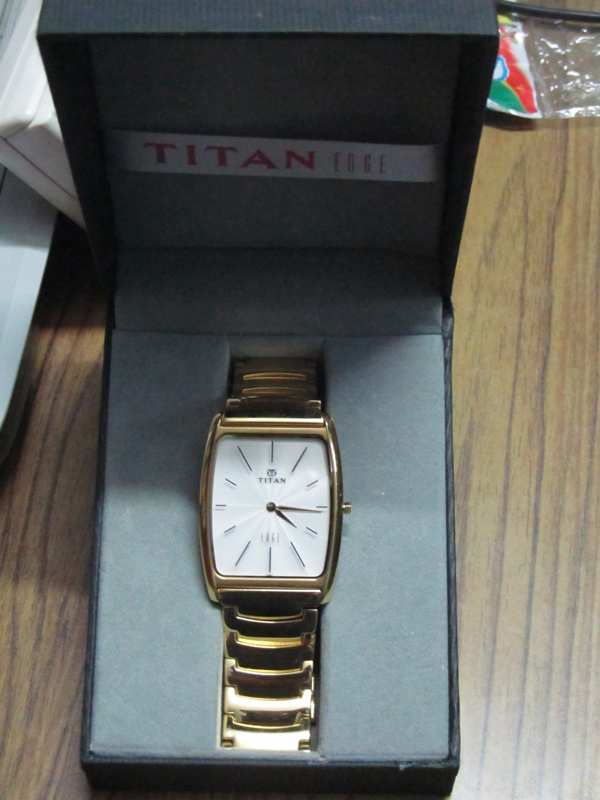 Totally New Looking Titan Wristwatch large image 0