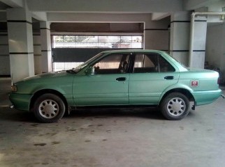 Nissan sunny Olive color Model-1993 Reg-1996 CC-1300