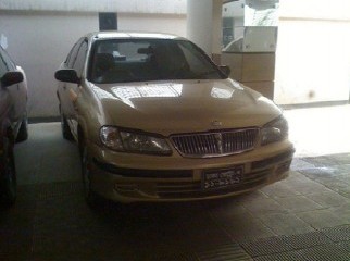 Nissan Sunny Model 2002 Golden color 1300cc