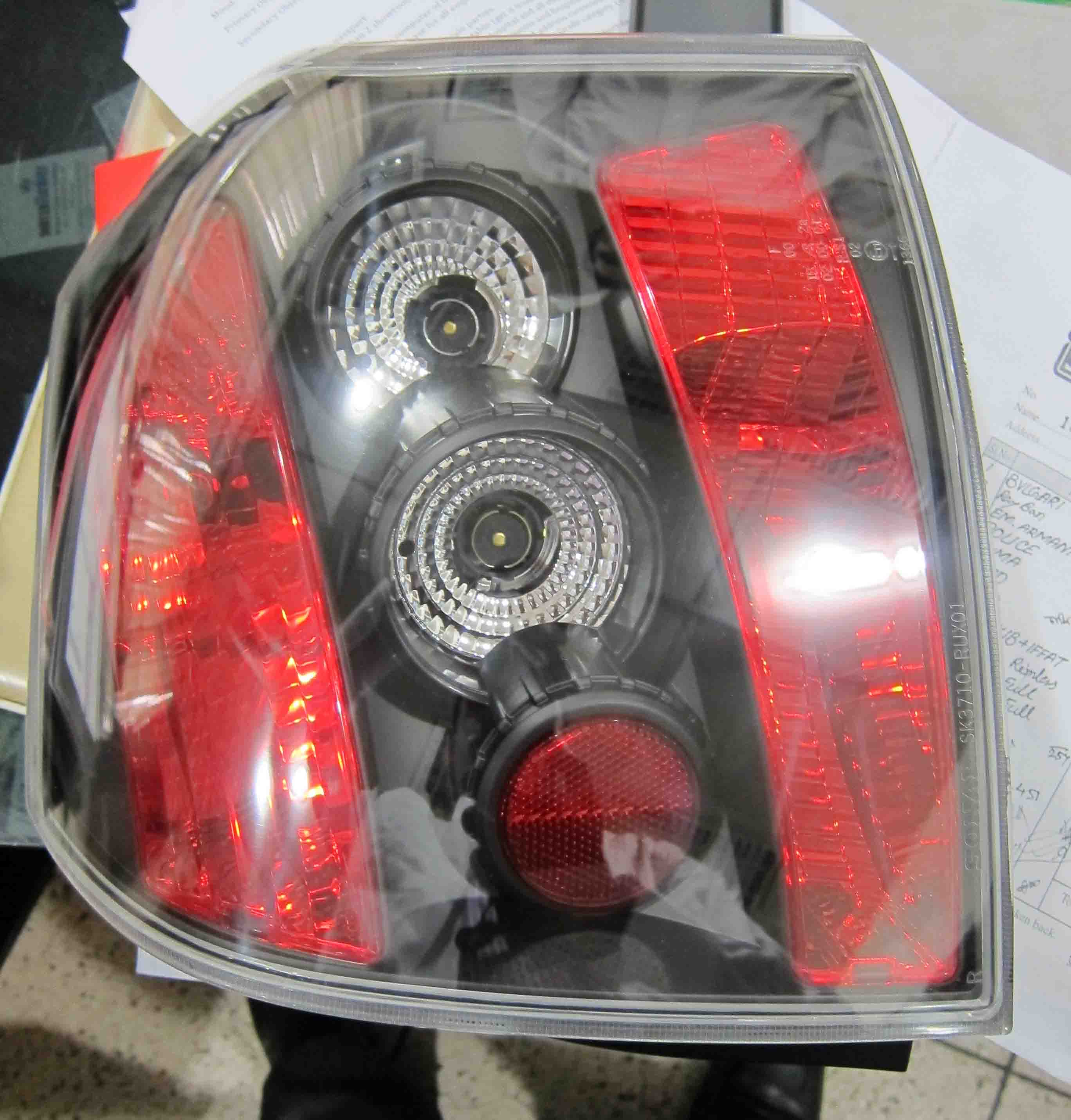 toyota runx alex 01-07 black housing tail light large image 0