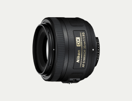 Nikon D5100 with 18-55mm and 35mm prime lens large image 1