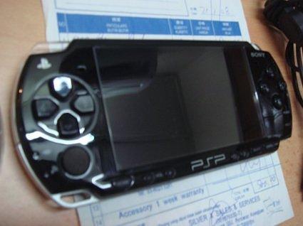 PSP SLIM BLACK BRAND NEW large image 0