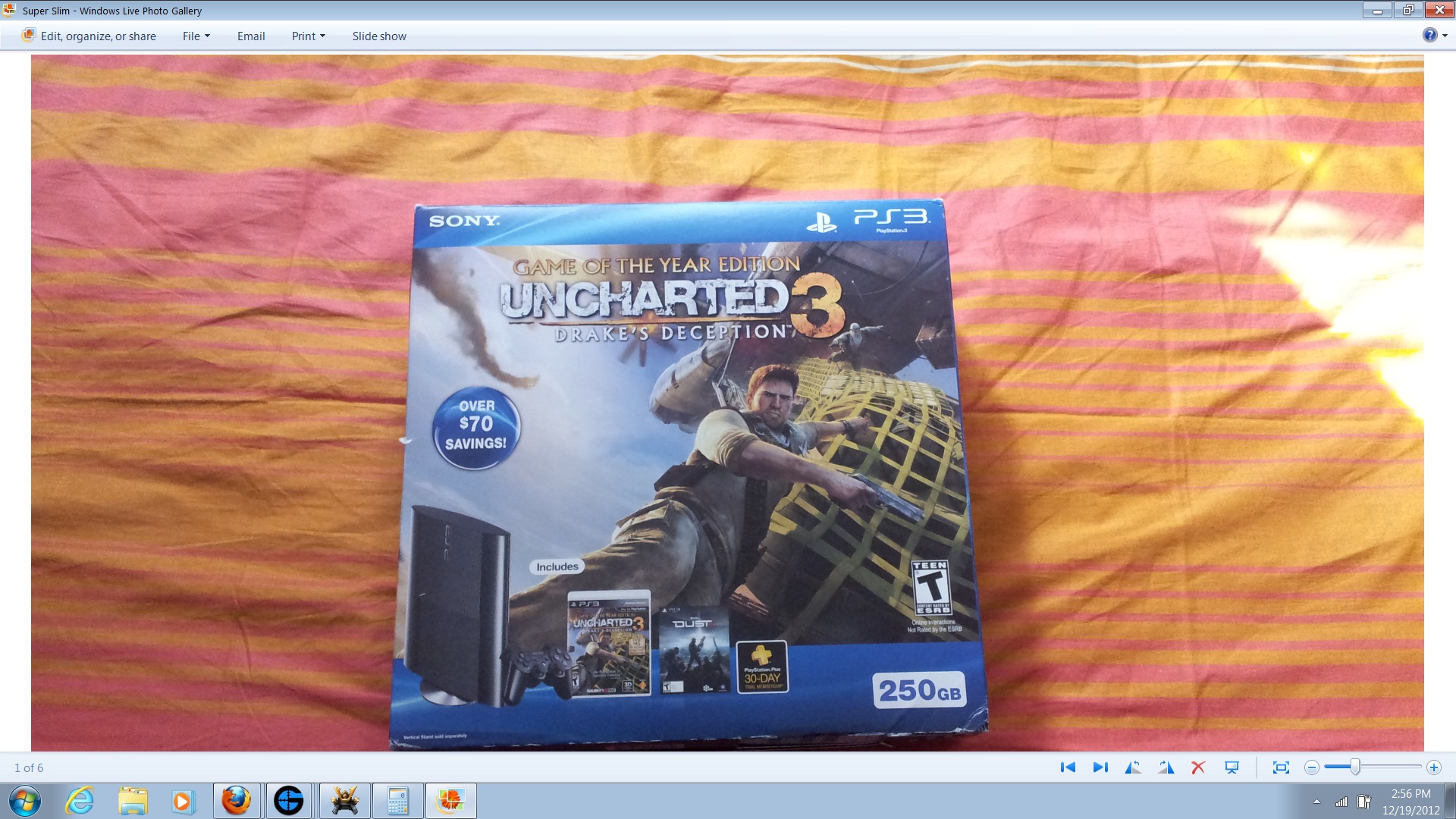 PS3 Super Slim Unchartered 3 Dust bundle Brand New Sealed large image 0